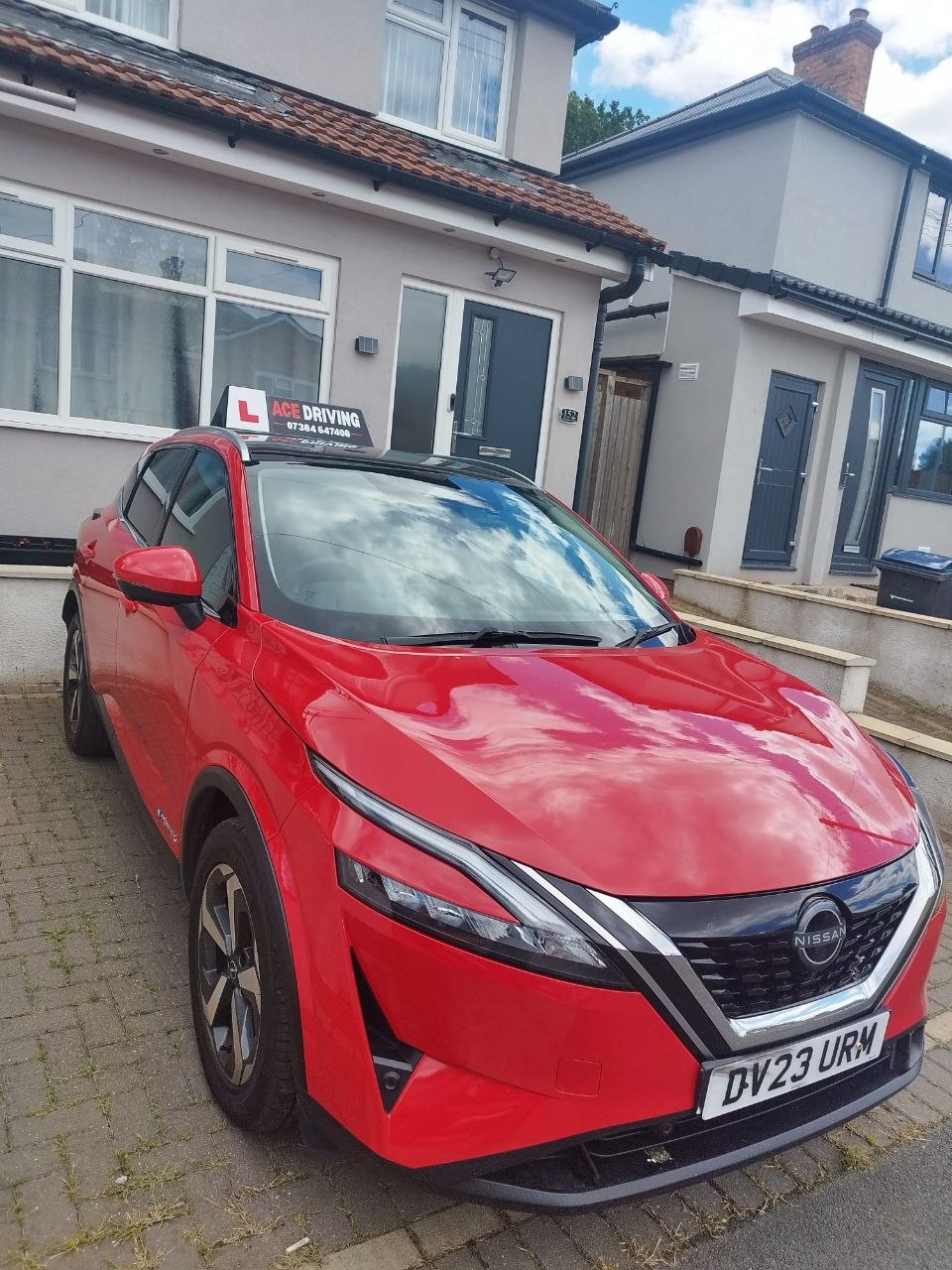 Amer — automatic instructor, red Nissan Qashqai